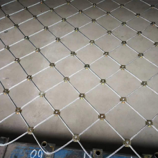 Сетка нержавеющая тросовая со скобочным креплением и ромбической ячейкой Н4 7х7 AISI 304 40х69х2 мм